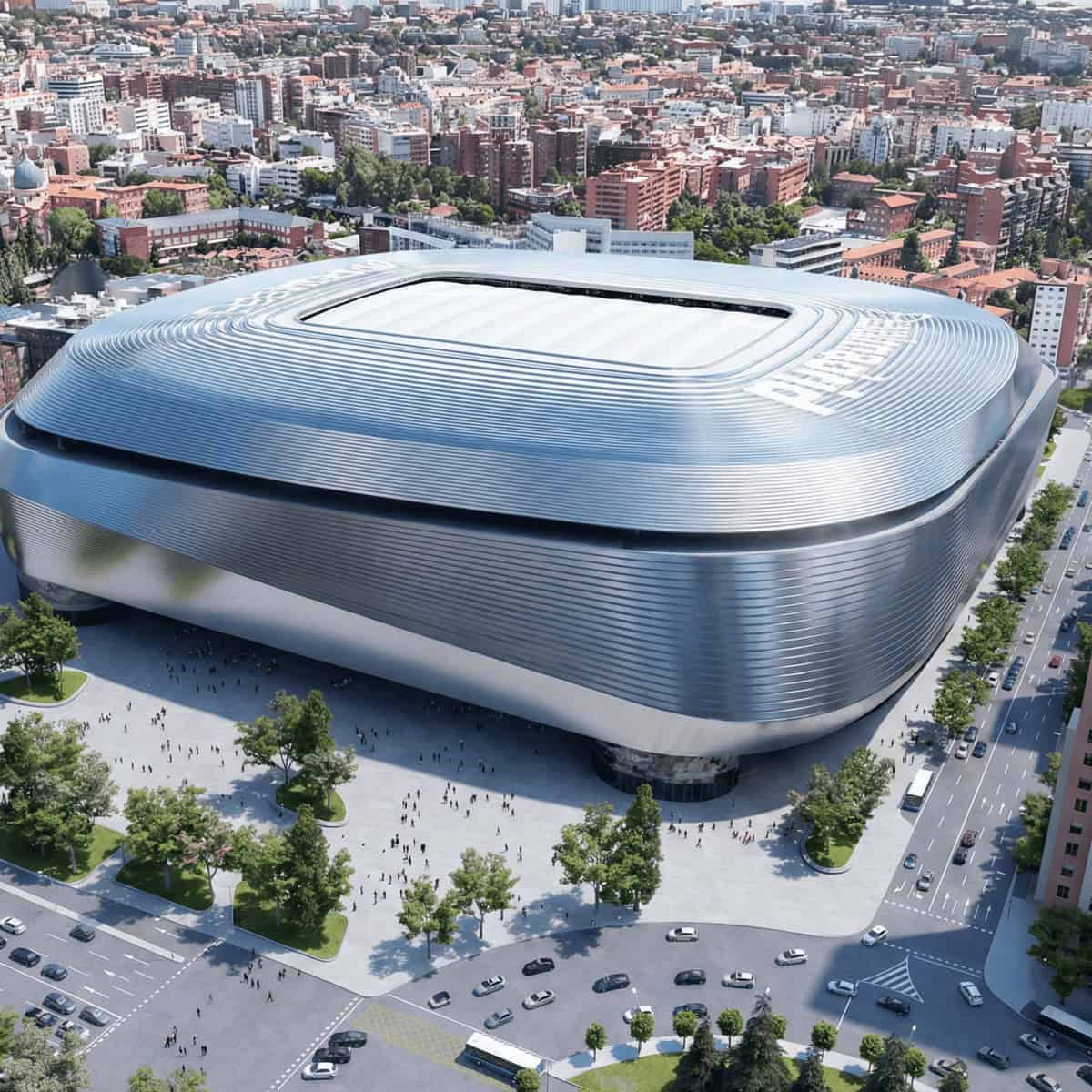 Estadio con diseño innovador y estructura metálica moderna en el centro de la ciudad. Capacidad para.